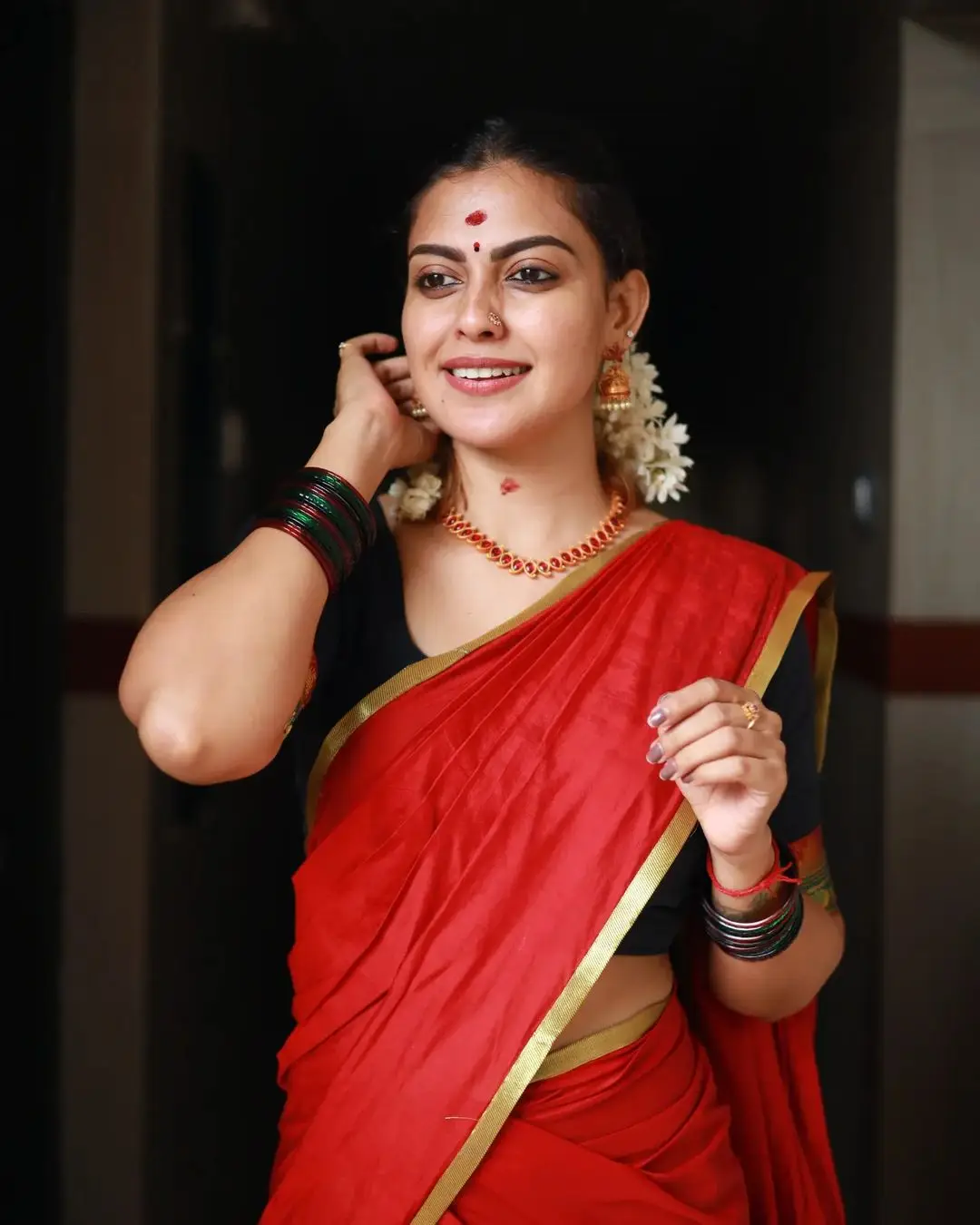 Indian Actress Anusree Nair in Red Color Saree Blouse